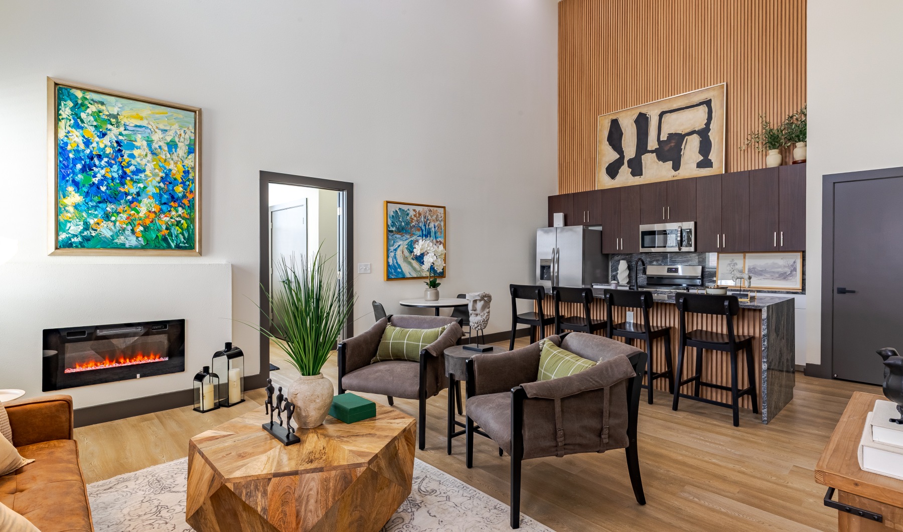 living room with seating and artwork living room with seating and artwork